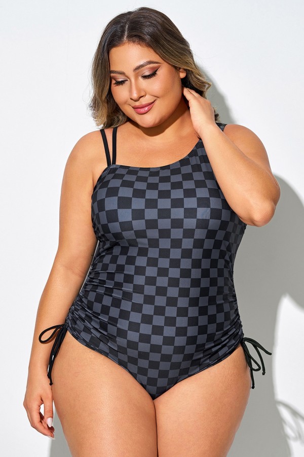 Traje de baño de una pieza con escote asimétrico y estampado de cuadros negros
