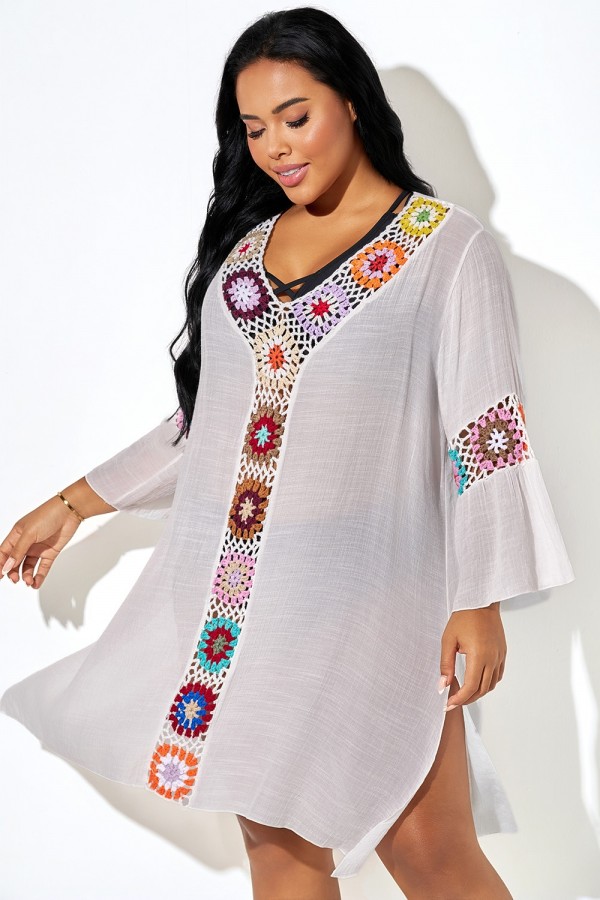 Túnica suelta de crochet con abertura lateral y flores coloridas
