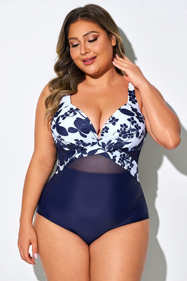 Traje de baño de una pieza con aros y malla recortada con flores azules