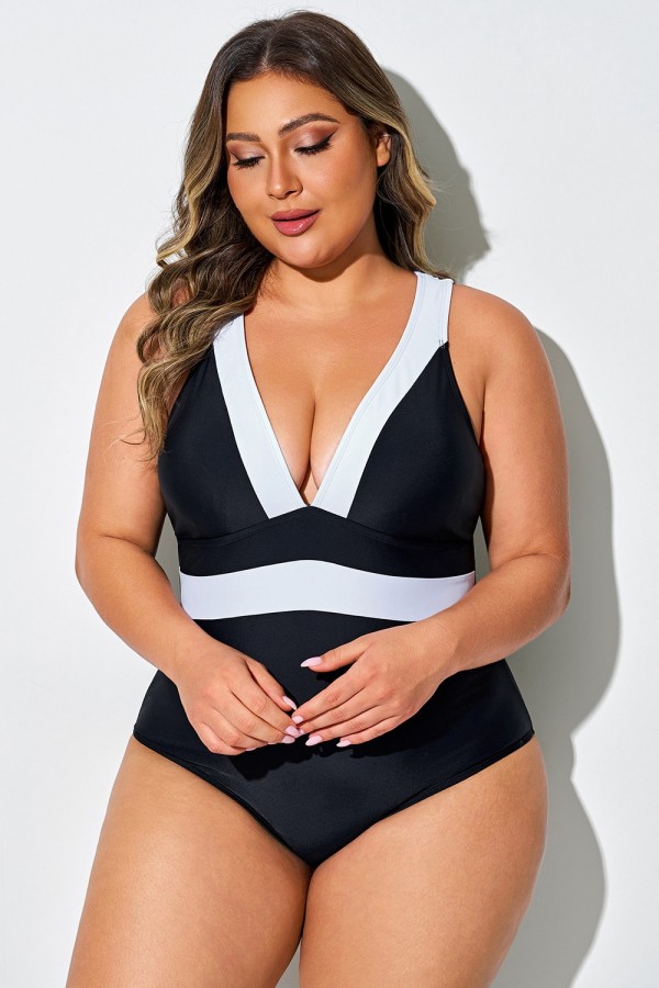 Traje de baño de una pieza con lazo en la espalda y bloques de color blanco y negro