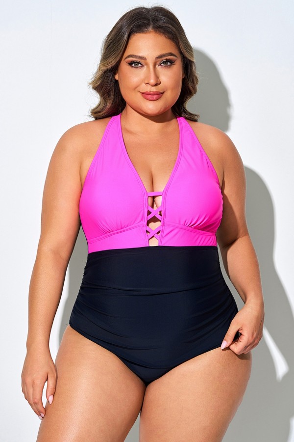 Traje de baño de una pieza rosa y negro con escote en V profundo