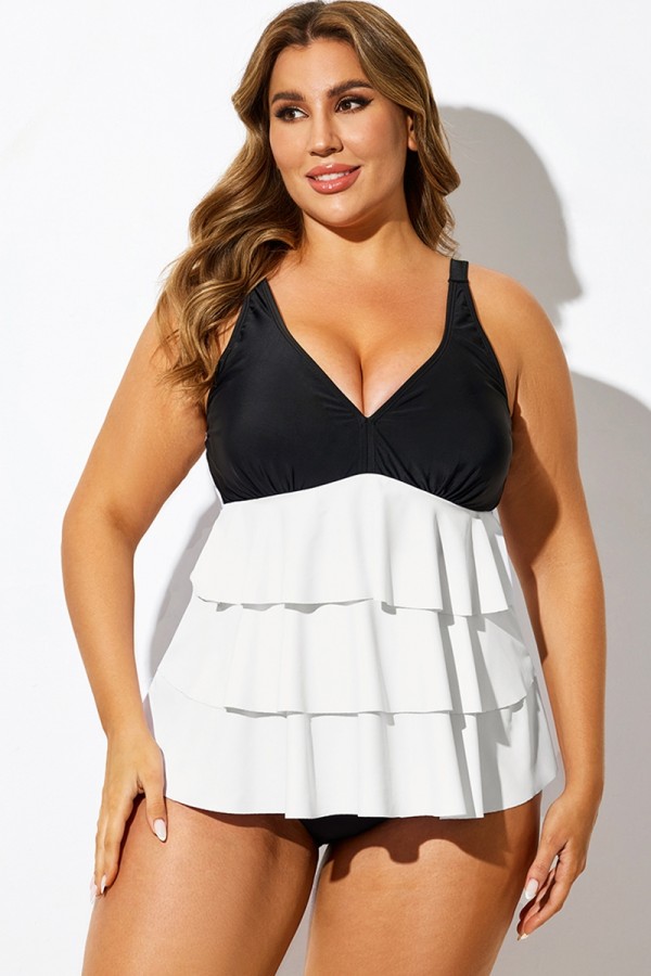 Top tankini escalonado con bloques de color en blanco y negro