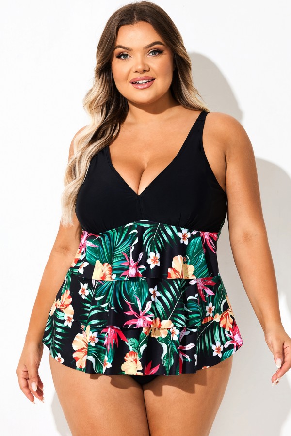 Top tankini con bloques de color y estampado floral negro