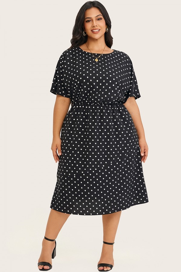 Vestido camisero con bolsillo con abertura y cinturilla elástica con lunares
