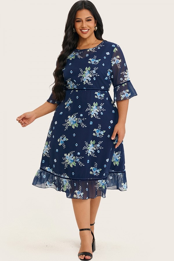 Vestido midi azul con cuello redondo y bordado de flores silvestres