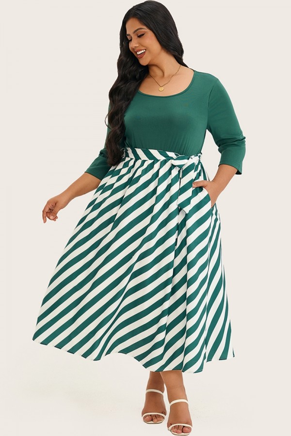Vestido midi entallado con vuelo y falda estampada a rayas