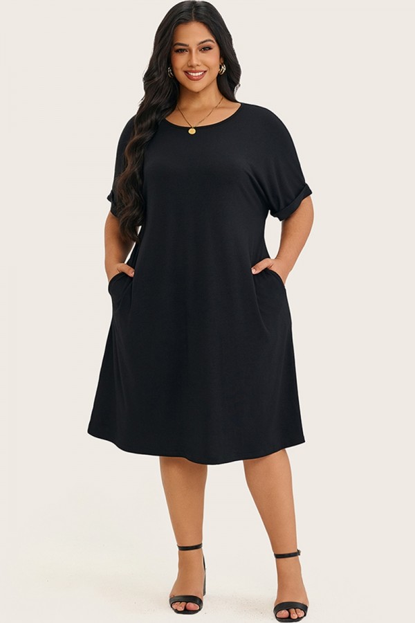 Vestido midi suelto negro liso con cuello redondo