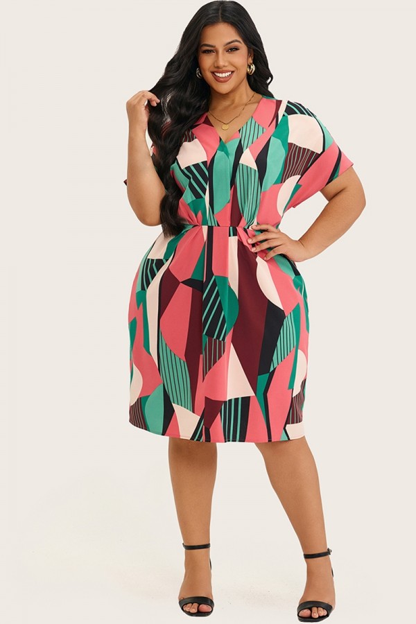 Vestido midi con cintura ceñida y manga de murciélago en bloques de color