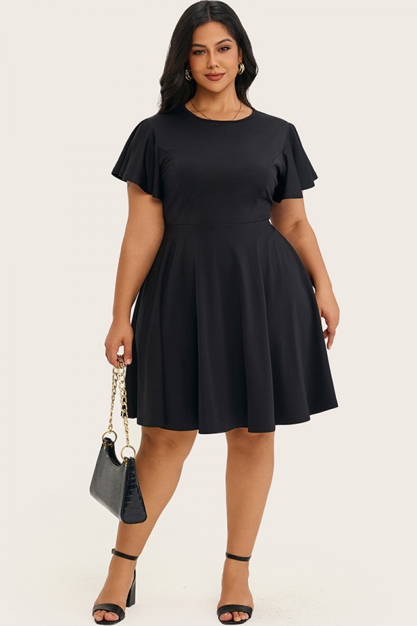 Vestido midi acampanado con mangas de mariposa y color negro liso