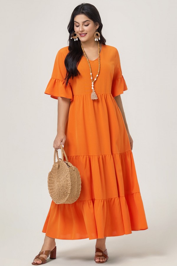 Vestido largo naranja con mangas con volantes y dobladillo escalonado