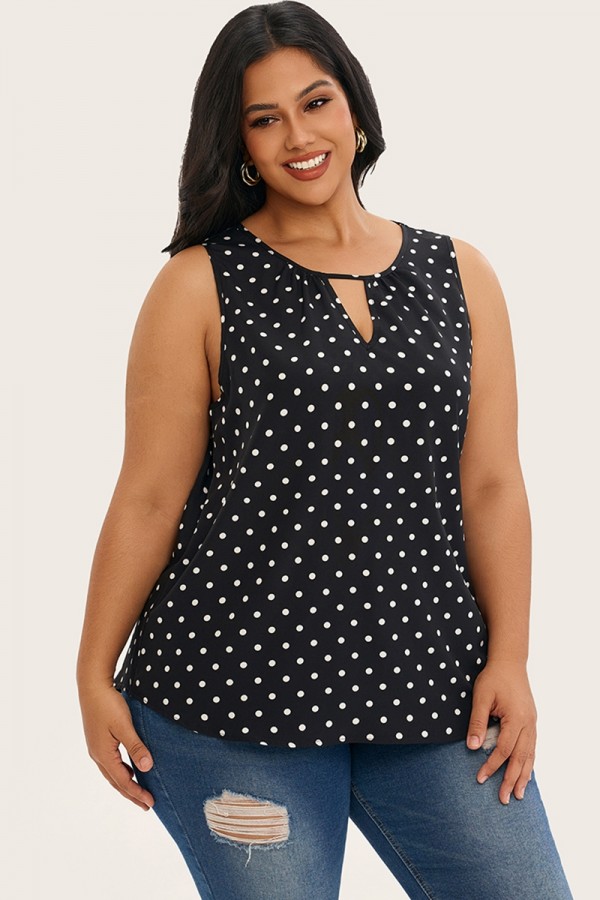 Blusa sin mangas ahuecada con estampado de lunares