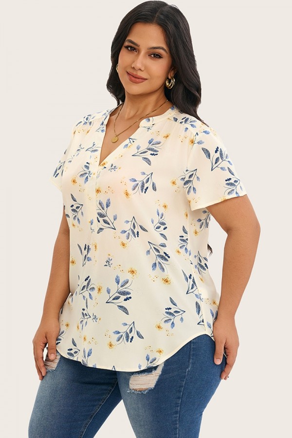 Blusa de manga corta con volantes y estampado floral