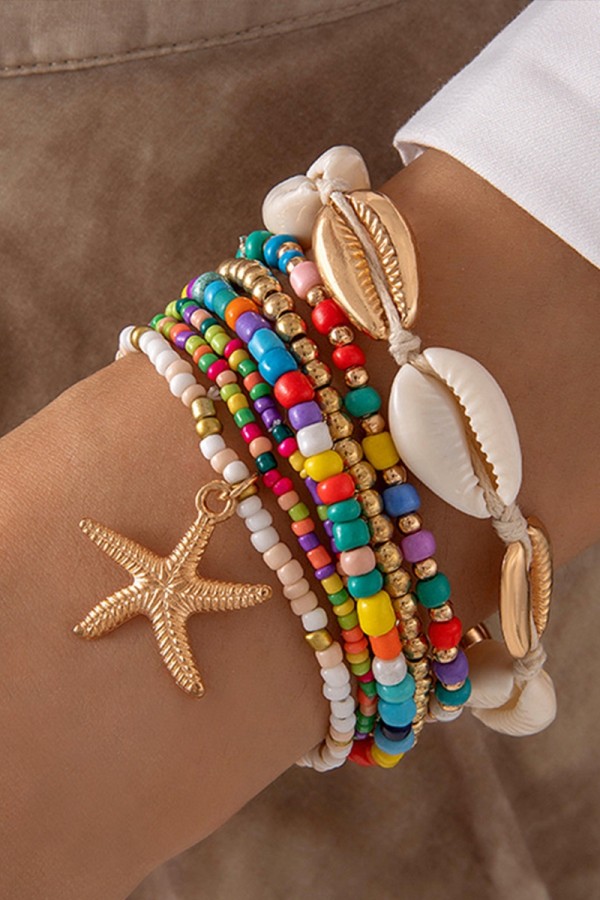 Juego de pulseras decorativas con cuentas de arroz y estrellas de mar