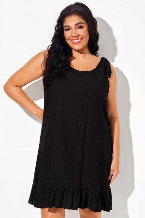 Vestido playero negro sin mangas con volantes y espalda abierta