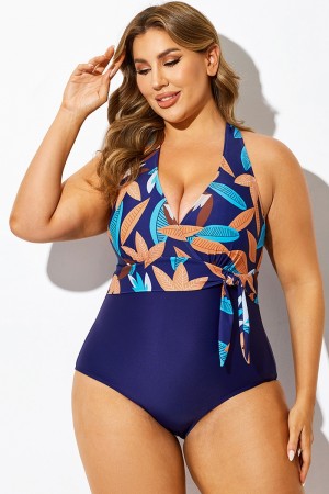 Traje de baño de una pieza con cuello en V y espalda cruzada con estampado tropical