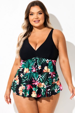 Top tankini con bloques de color y estampado floral negro