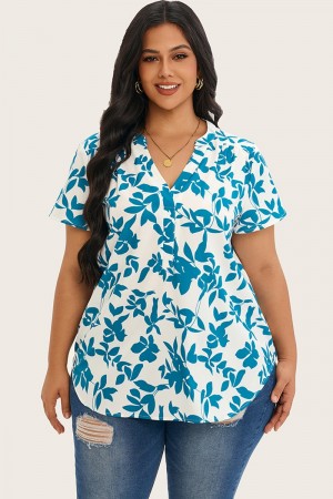 Blusa de manga corta con vuelo de crepé y estampado floral de silueta