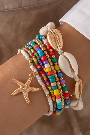 Juego de pulseras decorativas con cuentas de arroz y estrellas de mar